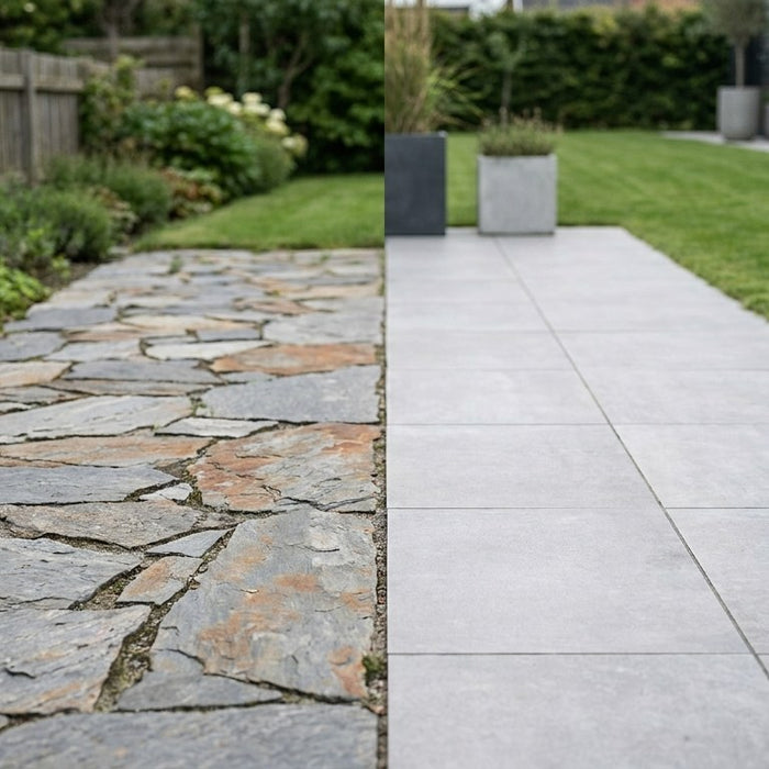 En smuk og nyanlagt terrasse, der illustrerer forskellen mellem rustikke natursten og stringente keramiske fliser i et moderne dansk havemiljø.